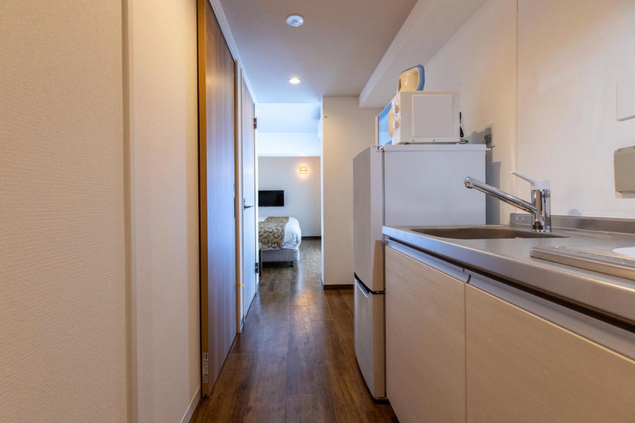 Mr Kinjo 万座ビーチ前 Lejlighedshotel Onna Eksteriør billede
