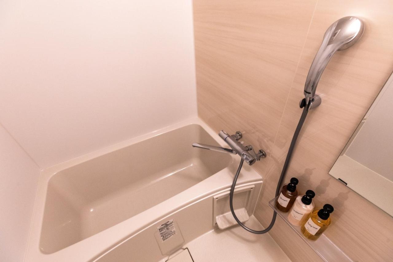 Mr Kinjo 万座ビーチ前 Lejlighedshotel Onna Eksteriør billede