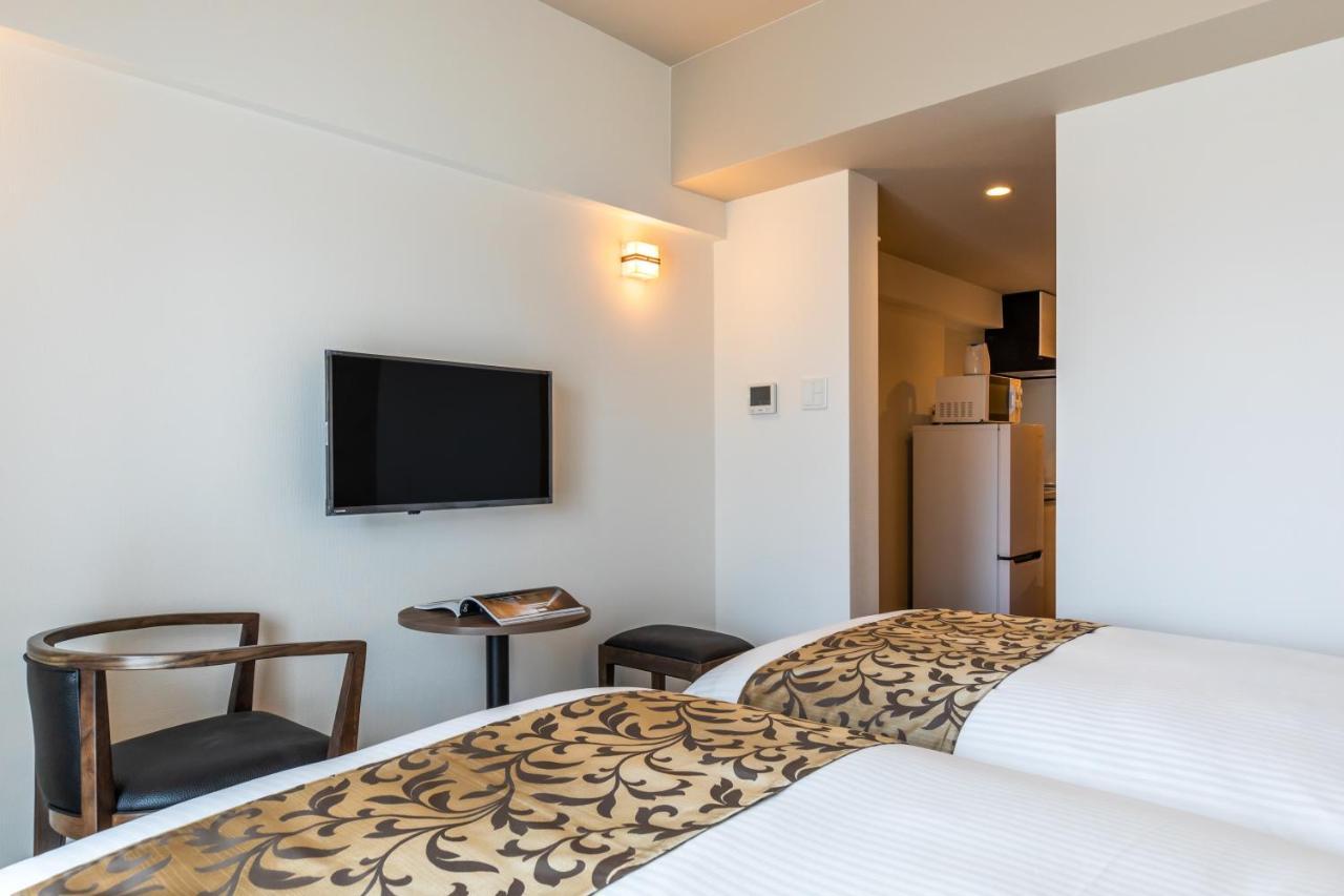Mr Kinjo 万座ビーチ前 Lejlighedshotel Onna Eksteriør billede